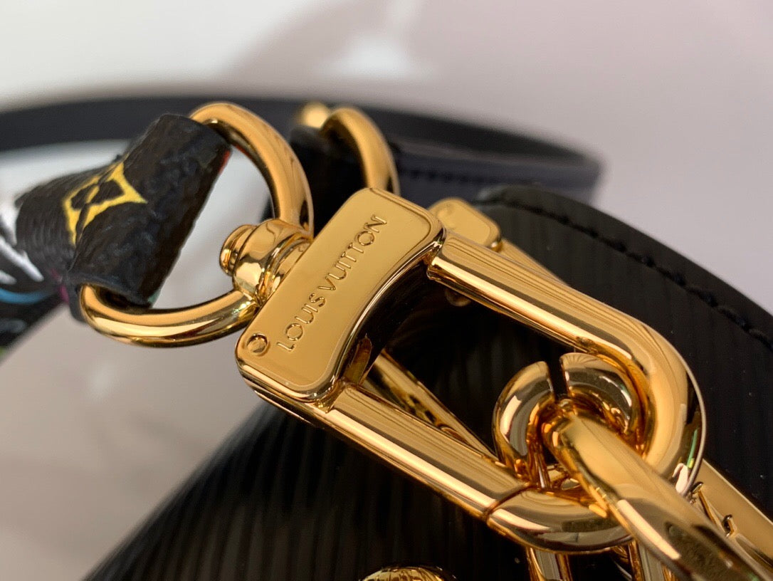 A Symphony of Quilted Elegance and Metallic Grace