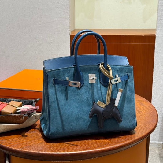 Bold Chains and Luxe Quilted Design for the Perfect Finish